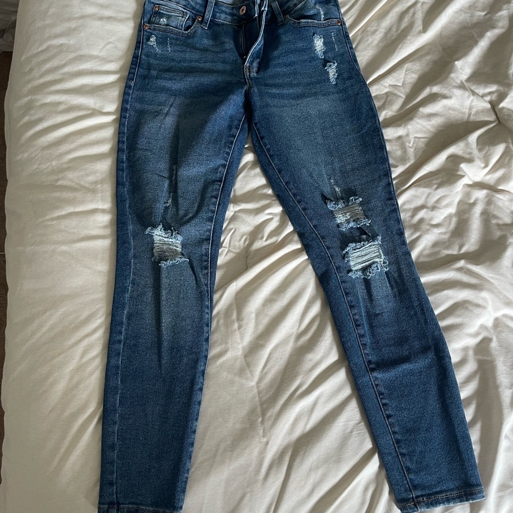 Women's Distressed Blue Jeans